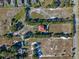 Bird's-eye view showcasing a large home with surrounding land at 502 W Lester Rd, Apopka, FL 32712