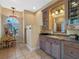 Bathroom with soaking tub, double vanity and shower at 502 W Lester Rd, Apopka, FL 32712