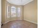 Bright bedroom with tile floors and large windows at 502 W Lester Rd, Apopka, FL 32712