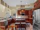 Well-equipped kitchen with dark wood cabinets at 502 W Lester Rd, Apopka, FL 32712