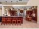 Eat-in kitchen with ample cabinetry and island at 502 W Lester Rd, Apopka, FL 32712