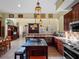 Island kitchen with granite countertop and breakfast bar at 502 W Lester Rd, Apopka, FL 32712