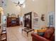 Spacious living room features a fireplace and high ceilings at 502 W Lester Rd, Apopka, FL 32712