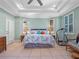 Spacious main bedroom with king-size bed and lots of natural light at 502 W Lester Rd, Apopka, FL 32712