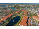 Aerial view of community with lake and fountain at 5578 Metrowest Blvd # 101, Orlando, FL 32811