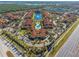 Aerial view of community, pool, and landscaping at 5578 Metrowest Blvd # 101, Orlando, FL 32811