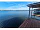 Stunning lake view from a wooden dock, providing a serene waterfront setting at 1003 Oakdale St, Windermere, FL 34786