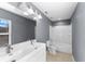 Bathroom with double vanity, tub, and shower at 15321 Beamleigh Rd, Winter Garden, FL 34787
