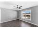 Bright bedroom with wood-look floors and a ceiling fan at 15321 Beamleigh Rd, Winter Garden, FL 34787