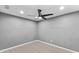 Bright bedroom with ceiling fan and laminate flooring at 15321 Beamleigh Rd, Winter Garden, FL 34787
