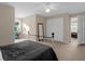 Bright bedroom with double bed and built-in closet at 1813 Sugar Cove Ct, Ocoee, FL 34761