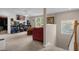 Fun game room with arcade games, seating, and large TV at 1813 Sugar Cove Ct, Ocoee, FL 34761