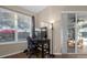 Home office with large window and backyard view at 1813 Sugar Cove Ct, Ocoee, FL 34761
