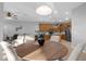 Bright kitchen with wood cabinets, stainless steel appliances and an island at 1813 Sugar Cove Ct, Ocoee, FL 34761