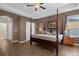 Main bedroom with ensuite bathroom access at 1813 Sugar Cove Ct, Ocoee, FL 34761