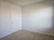 Small bedroom with carpeted floor and window with blinds at 1884 Hickory Bluff Rd, Kissimmee, FL 34744
