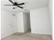 Bright bedroom featuring a ceiling fan and neutral wall colors at 1884 Hickory Bluff Rd, Kissimmee, FL 34744