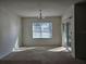 Bright dining room with large window and sliding glass door at 1884 Hickory Bluff Rd, Kissimmee, FL 34744