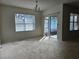 Sunlit dining area with access to backyard patio at 1884 Hickory Bluff Rd, Kissimmee, FL 34744
