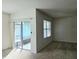 Living area with sliding glass doors leading to backyard at 1884 Hickory Bluff Rd, Kissimmee, FL 34744