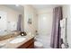 Clean bathroom with a tub, shower, and granite vanity at 4738 Sleepy Hollow Dr, Kissimmee, FL 34746
