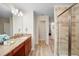 Bathroom with granite countertops, a large shower, and a garden tub at 4738 Sleepy Hollow Dr, Kissimmee, FL 34746