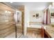Bathroom includes a large soaking tub and walk-in shower at 4738 Sleepy Hollow Dr, Kissimmee, FL 34746