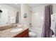 Clean bathroom with tub, shower, and granite vanity at 4738 Sleepy Hollow Dr, Kissimmee, FL 34746