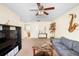 Spacious bonus room with sectional sofa and TV at 4738 Sleepy Hollow Dr, Kissimmee, FL 34746