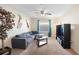 Bonus room with sectional sofa and TV at 4738 Sleepy Hollow Dr, Kissimmee, FL 34746