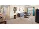 Bonus room with sectional sofa and TV at 4738 Sleepy Hollow Dr, Kissimmee, FL 34746