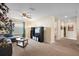 Bonus room with sectional sofa, TV and window at 4738 Sleepy Hollow Dr, Kissimmee, FL 34746