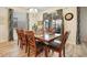 Bright dining room featuring a large table with seating for eight at 4738 Sleepy Hollow Dr, Kissimmee, FL 34746