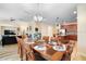 Large dining room table with seating for eight at 4738 Sleepy Hollow Dr, Kissimmee, FL 34746