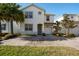 Two-story house with a paved driveway and well-maintained lawn at 4738 Sleepy Hollow Dr, Kissimmee, FL 34746