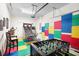 Game room with foosball, basketball game and colorful floor at 4738 Sleepy Hollow Dr, Kissimmee, FL 34746