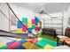 Game room with foosball, basketball game and colorful floor at 4738 Sleepy Hollow Dr, Kissimmee, FL 34746