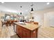 Kitchen boasts an island with seating and granite countertops at 4738 Sleepy Hollow Dr, Kissimmee, FL 34746