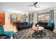 Spacious living room with comfortable seating and a large TV at 4738 Sleepy Hollow Dr, Kissimmee, FL 34746