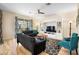 Living area showcases comfortable sofas and a large TV at 4738 Sleepy Hollow Dr, Kissimmee, FL 34746