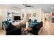 Living room features built-in shelving and a cozy seating area at 4738 Sleepy Hollow Dr, Kissimmee, FL 34746