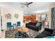 Open living room with views into kitchen and dining areas at 4738 Sleepy Hollow Dr, Kissimmee, FL 34746