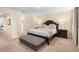 Spacious main bedroom with king-size bed and ensuite bath at 4738 Sleepy Hollow Dr, Kissimmee, FL 34746