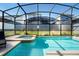 Enclosed heated pool and spa with a screened enclosure at 4738 Sleepy Hollow Dr, Kissimmee, FL 34746