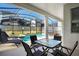 Enclosed pool and spa with patio furniture for relaxing at 4738 Sleepy Hollow Dr, Kissimmee, FL 34746