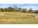 Open land with dirt trails and sparse vegetation at 10901 Island Grove Rd, Clermont, FL 34711