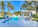 Stunning pool with spacious patio and tropical landscaping at 1123 Webster Ave, Orlando, FL 32804