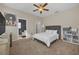 Spacious main bedroom with ensuite bathroom and large closet at 163 Jaybee Ave, Davenport, FL 33897