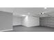Clean and spacious garage with painted walls and automatic door opener at 3553 Greenfield Ave, Orlando, FL 32808