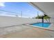 Clean rectangular pool with surrounding patio at 3553 Greenfield Ave, Orlando, FL 32808